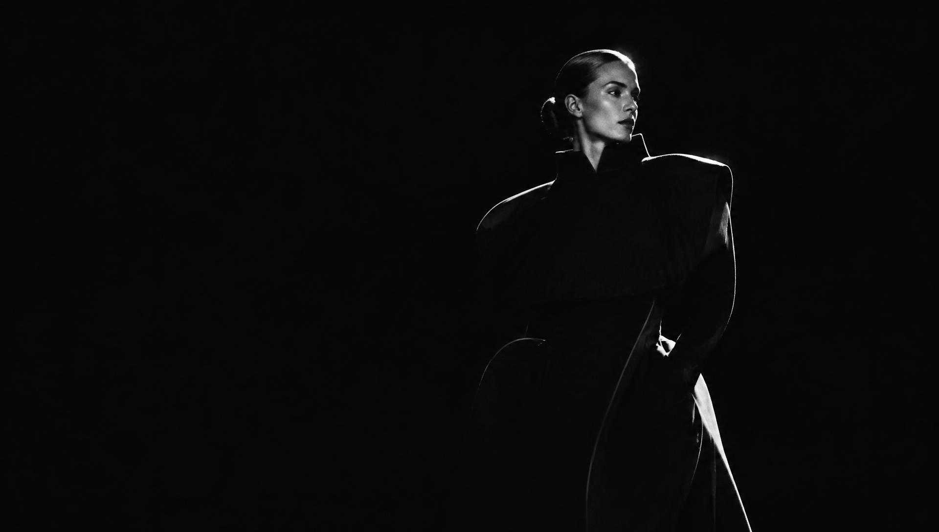 Editorial campaign portrait in dramatic silver light